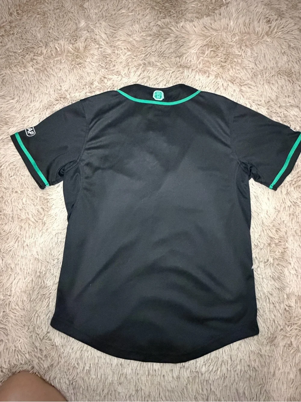 Black and Green Baseball-Style Jersey with 'T' Logo